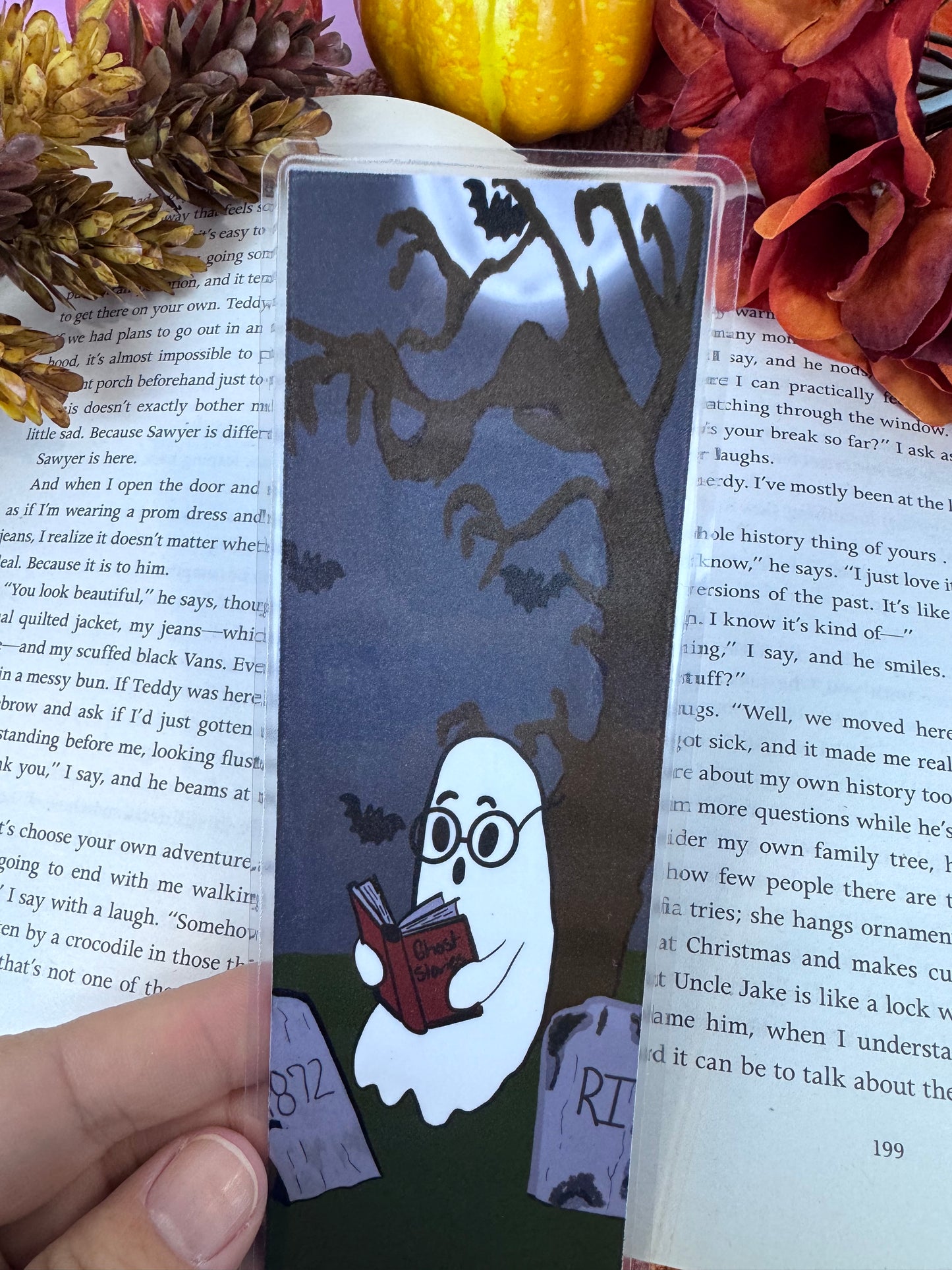Close-up of ghost bookmark with spooky tree and bats design
