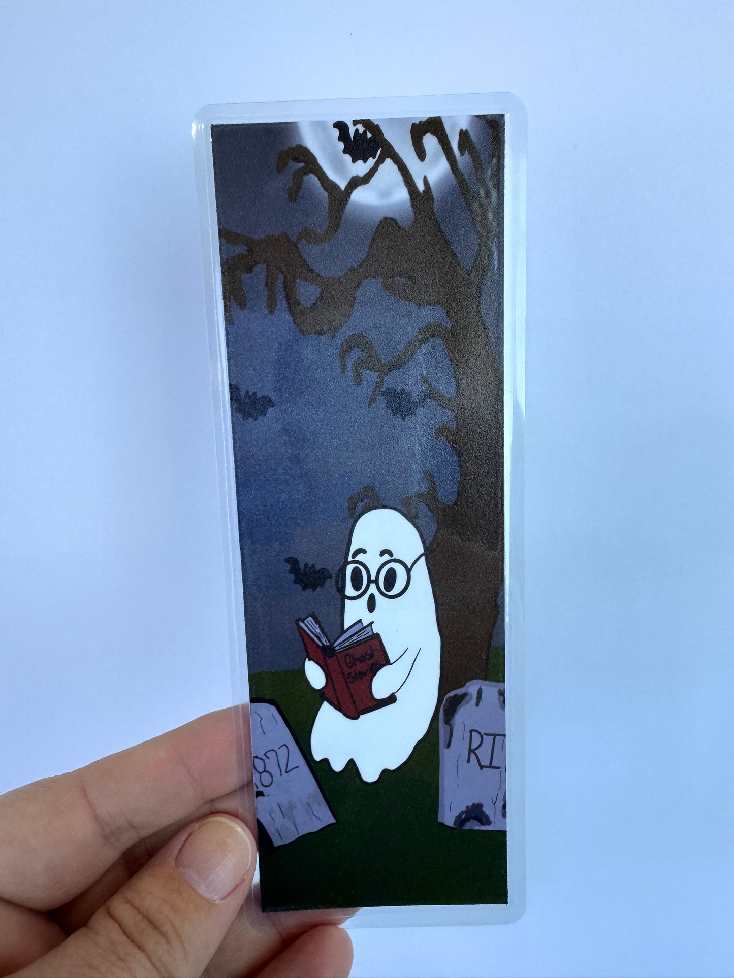 Cute Ghost Bookmark – Handmade Laminated Bookmark with Spooky Tree, Bats & Cemetery Scene | Ghost Reading Book of Ghost Stories | Halloween Book Lover Gift