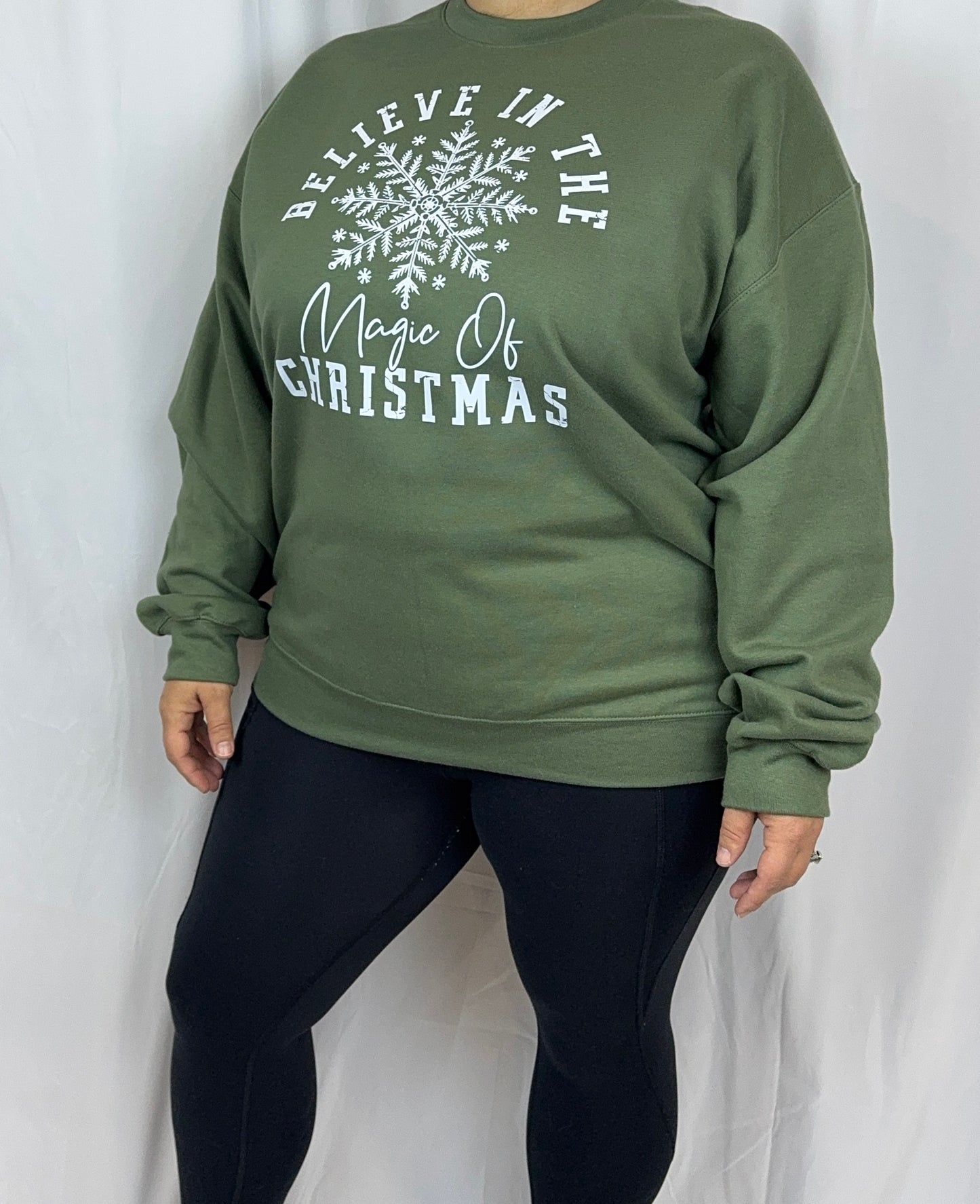 Believe In The Magic Of Christmas Cozy Sweatshirt: Military Green Crew Neck Sweatshirt