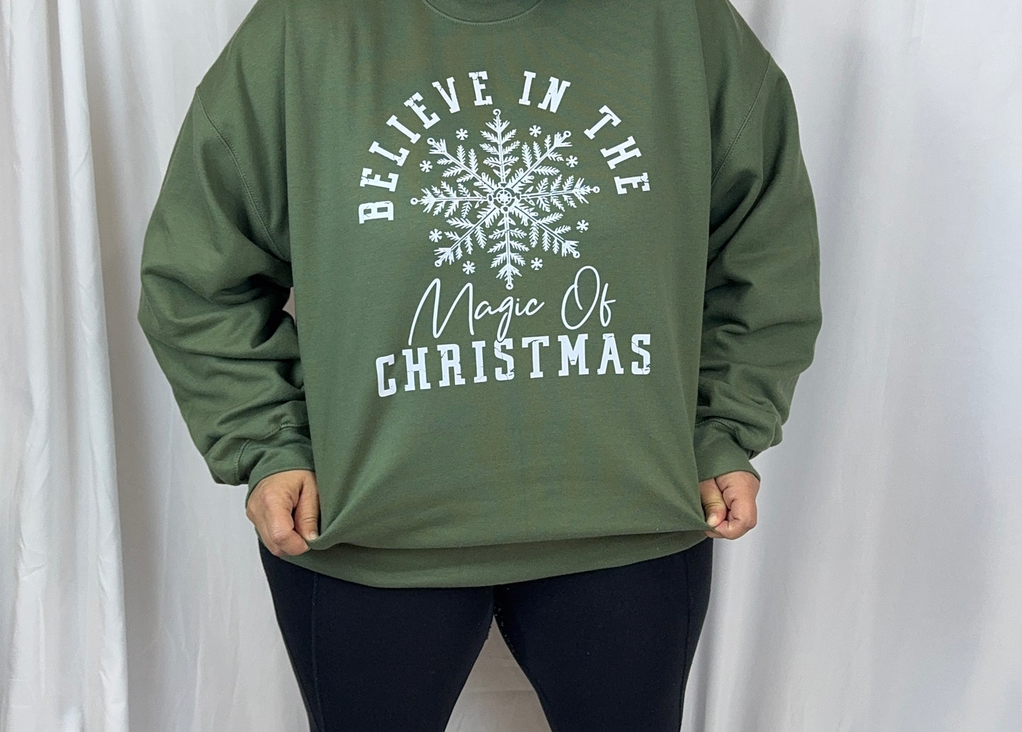 Believe In The Magic Of Christmas Cozy Sweatshirt: Military Green Crew Neck Sweatshirt