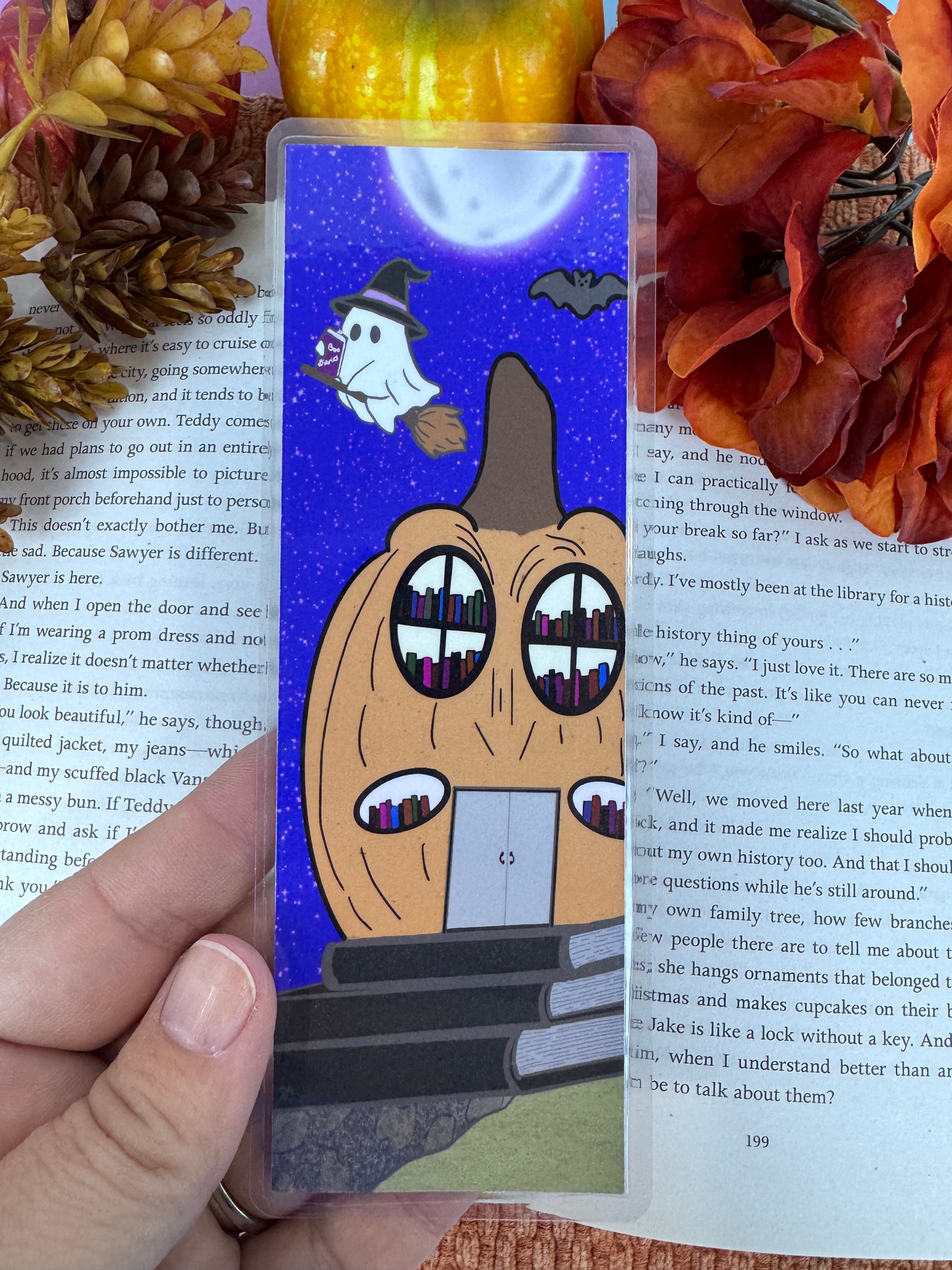 Halloween-themed laminated bookmark for book lovers
