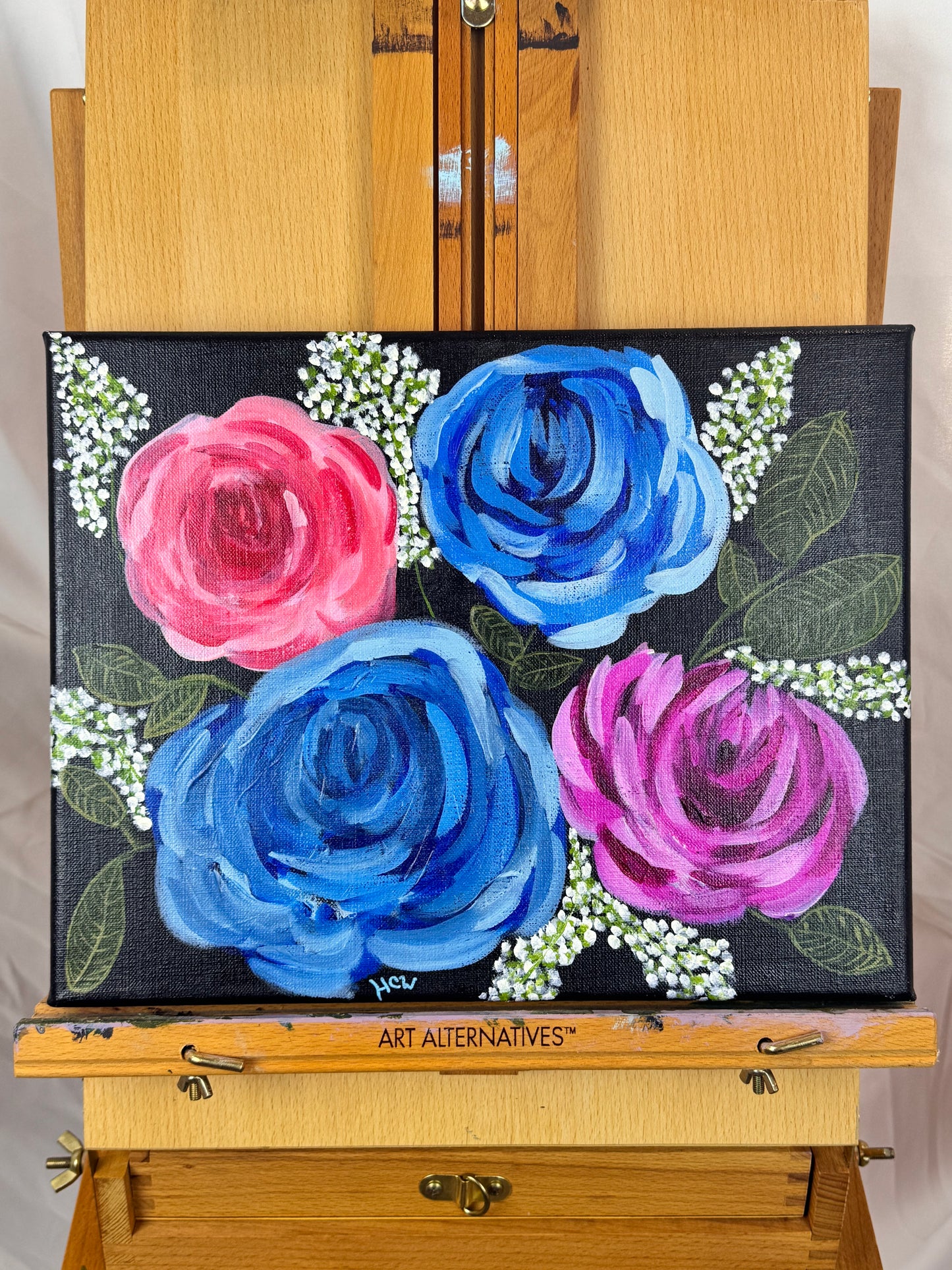 Impressionist Rose Painting in Acrylic. Black background with 2 blue, 1 red, 1 pink rose. 14x11 inches unframed, stretched canvas.