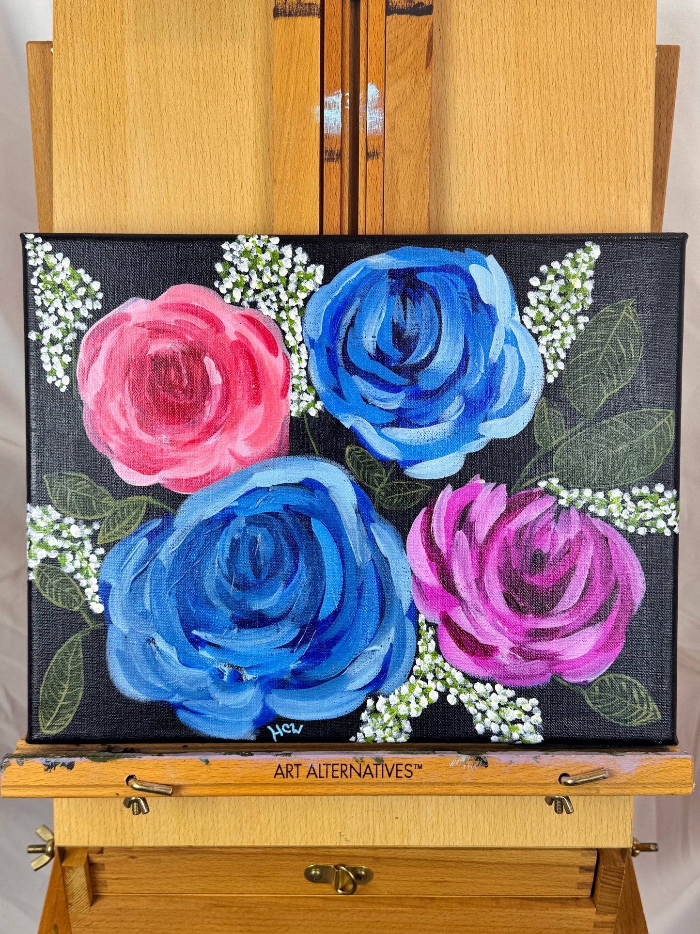 Impressionist Rose Painting in Acrylic. Black background with 2 blue, 1 red, 1 pink rose. 14x11 inches unframed, stretched canvas.