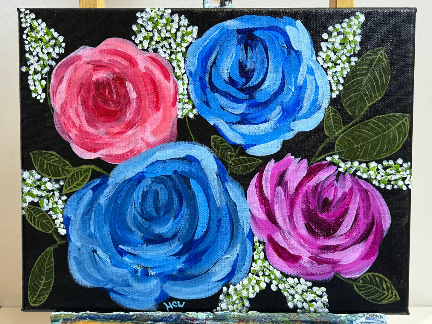 Impressionist Rose Painting in Acrylic. Black background with 2 blue, 1 red, 1 pink rose. 14x11 inches unframed, stretched canvas.