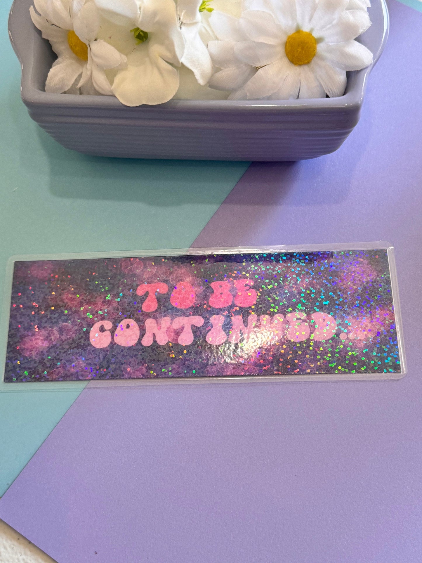 To Be Continued Holographic Laminated Bookmark